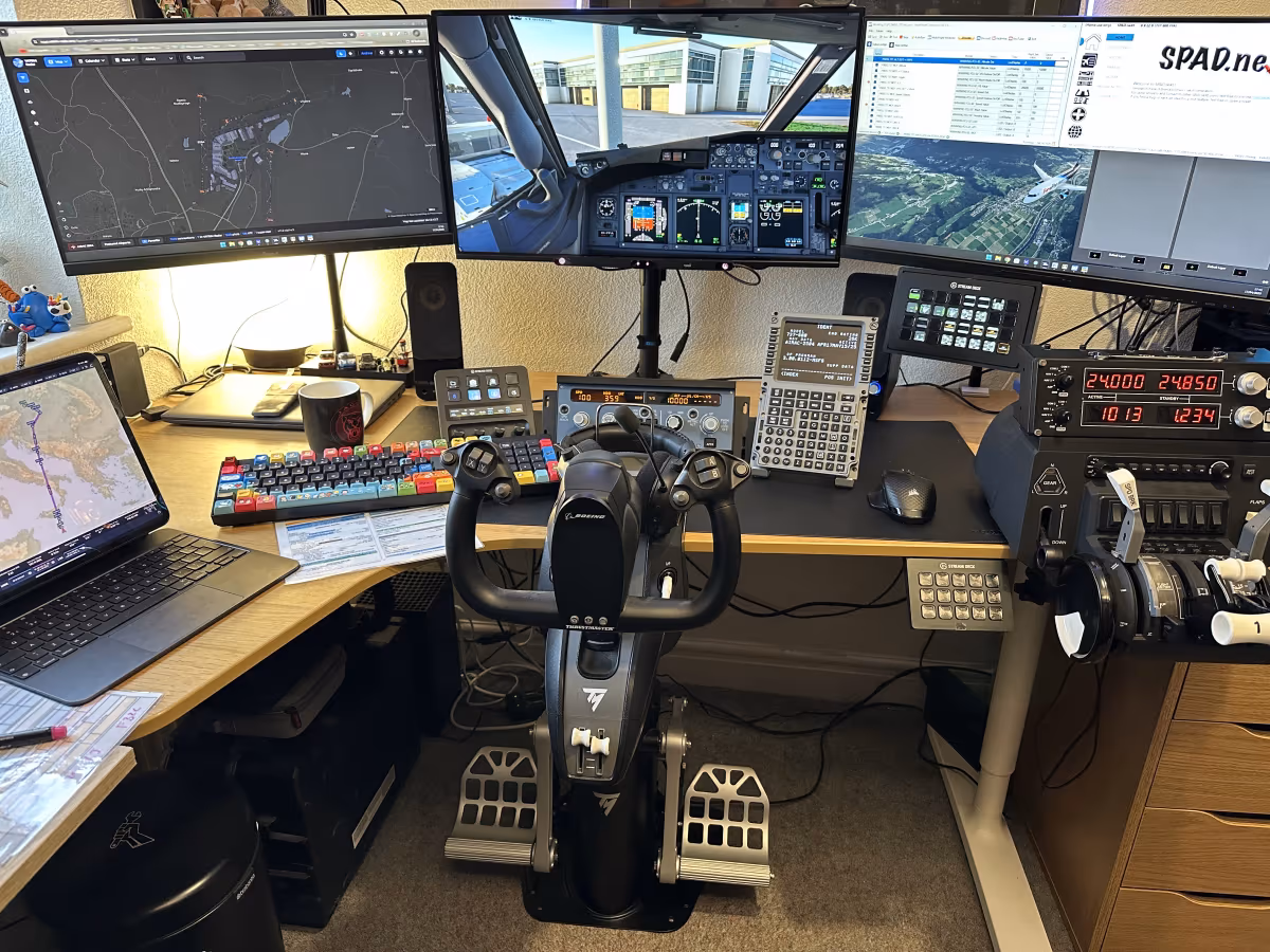 Boeing home cockpit setup with yoke, throttle quadrant, multi-function displays and custom switches for the 737 and 777 in Microsoft Flight Simulator